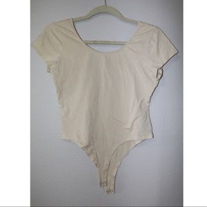 Beige short sleeve bodysuit top